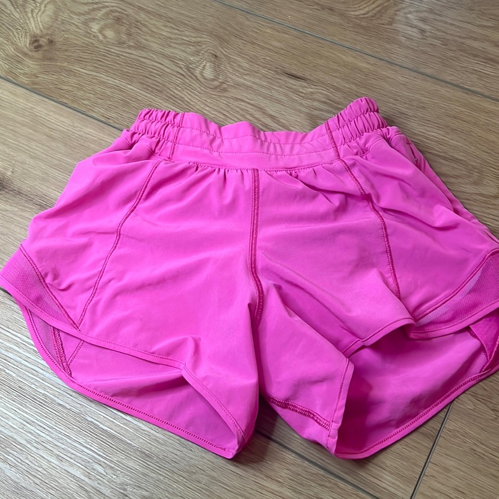 Lululemon 4 inch size 2 hotty hots in sonic pink